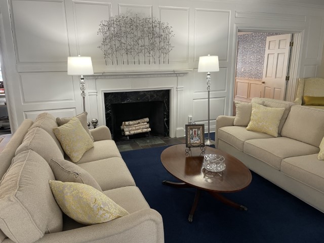 New chrome and crystal floor lamps frame the tree metal art
