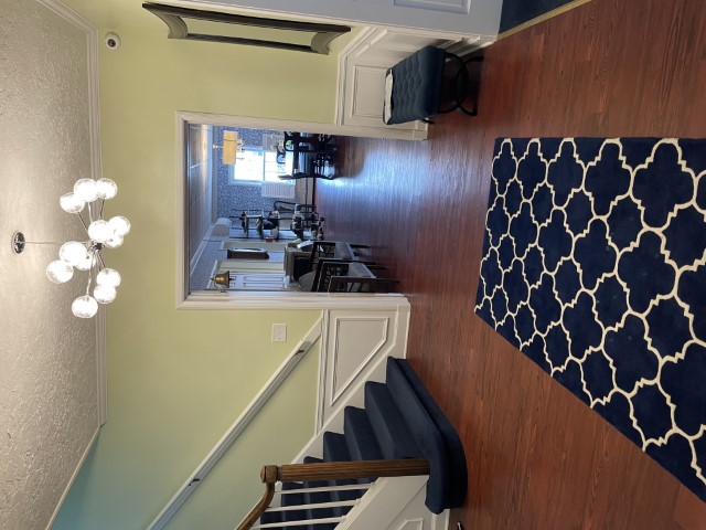 Entryway. New rugs, lighting, paint, bench, mirror