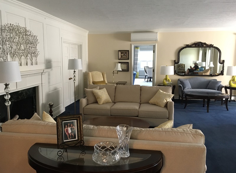 Formal sitting room looking into living room