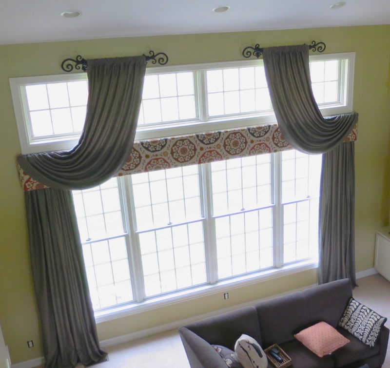 Arched swags and panels over cornice board.